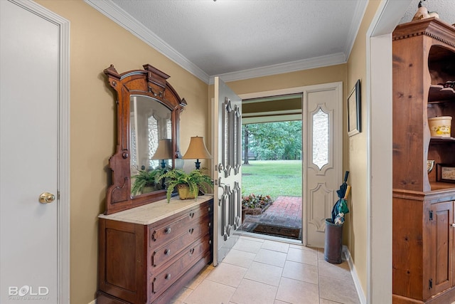 foyer with light tile patterned flooring, crown molding, and a textured ceiling