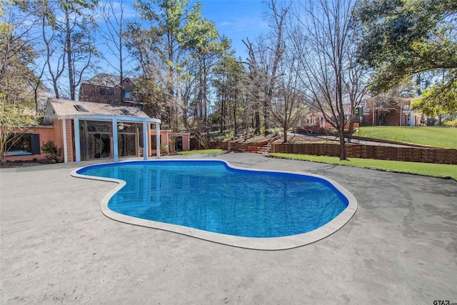2900 S Robertson Ave, Tyler, TX 75701 - view of swimming pool with a patio area, a lawn, and an outbuilding