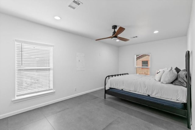 bedroom with baseboards, visible vents, and recessed lighting