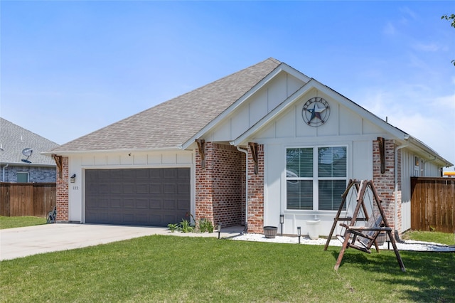 ranch-style house featuring an attached garage, fence, a shingled roof, a front lawn, and brick siding