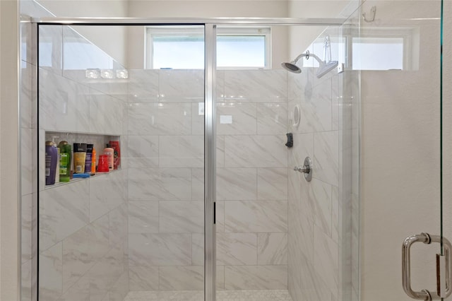 bathroom featuring a stall shower