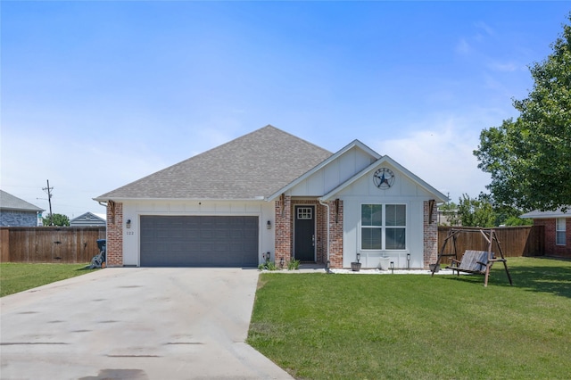 ranch-style home featuring brick siding, fence, an attached garage, concrete driveway, and a front lawn
