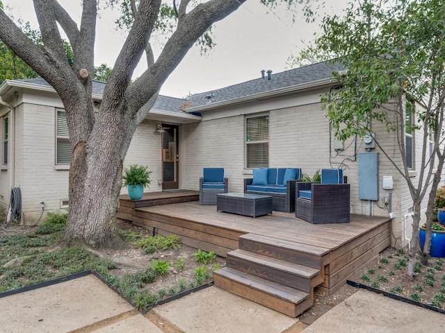 wooden deck featuring an outdoor living space
