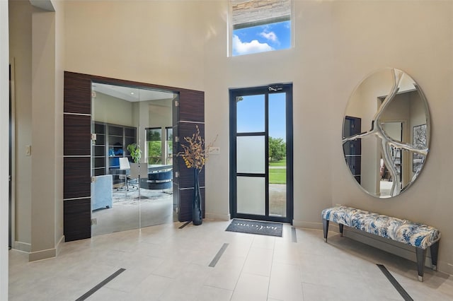 25 White Rock Trl, Lucas, TX 75002 - foyer entrance featuring a towering ceiling, baseboards, and plenty of natural light
