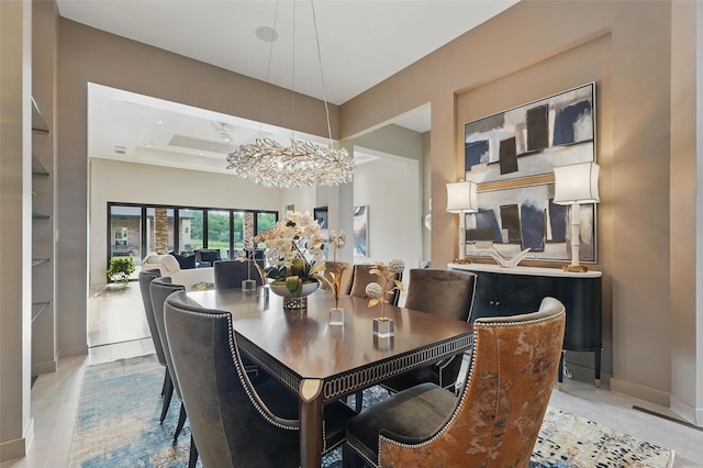 25 White Rock Trl, Lucas, TX 75002 - dining room with a tray ceiling, a chandelier, and baseboards