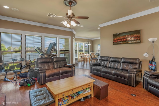 230 Welham Trce, Bossier City, LA 71112 - living room with crown molding, visible vents, ceiling fan with notable chandelier, and recessed lighting