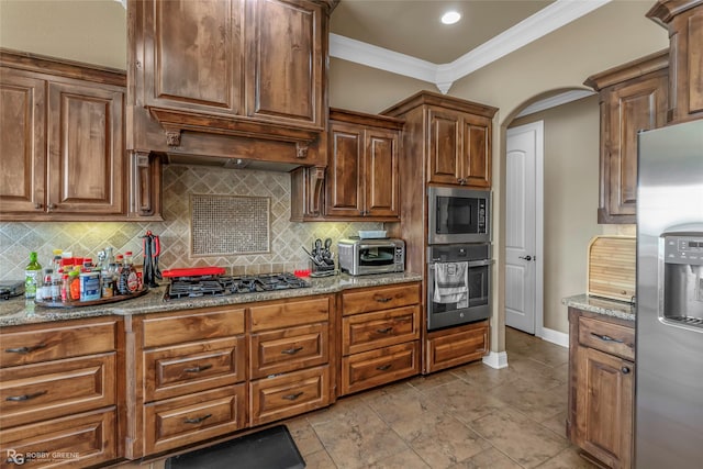 230 Welham Trce, Bossier City, LA 71112 - kitchen with ornamental molding, decorative backsplash, light stone counters, and appliances with stainless steel finishes