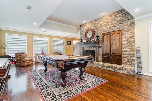 2204 Bridge View Ln, Plano, TX 75093 - game room featuring dark wood-type flooring, a fireplace, billiards, crown molding, and recessed lighting