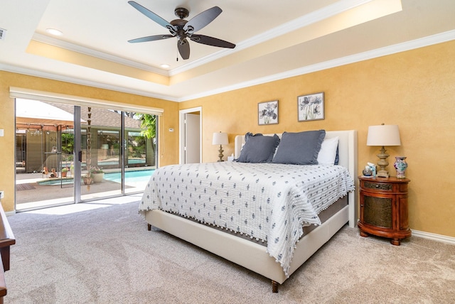 2204 Bridge View Ln, Plano, TX 75093 - carpeted bedroom featuring access to exterior, a raised ceiling, crown molding, a ceiling fan, and baseboards