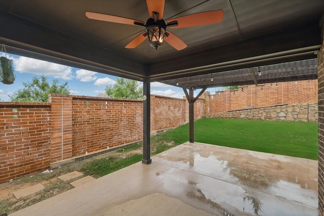 view of patio with ceiling fan and a fenced backyard