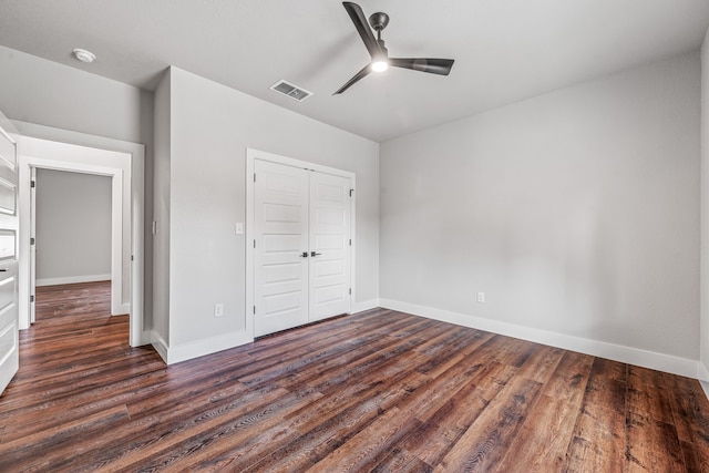 1007 Westwood, Graham, TX 76450 - spare room with ceiling fan, baseboards, and wood finished floors