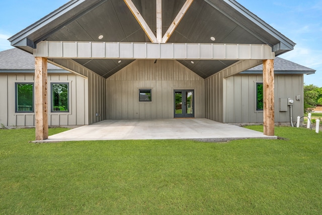 1007 Westwood, Graham, TX 76450 - rear view of house featuring a lawn, a patio area, french doors, and a shingled roof