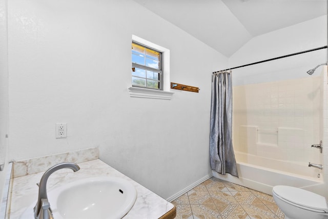 908 E Belknap St, Ennis, TX 75119 - full bathroom featuring tile patterned floors, vaulted ceiling, toilet, shower / bathtub combination with curtain, and baseboards