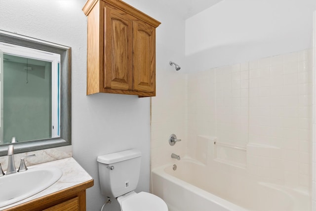 908 E Belknap St, Ennis, TX 75119 - full bathroom with toilet, tub / shower combination, and vanity