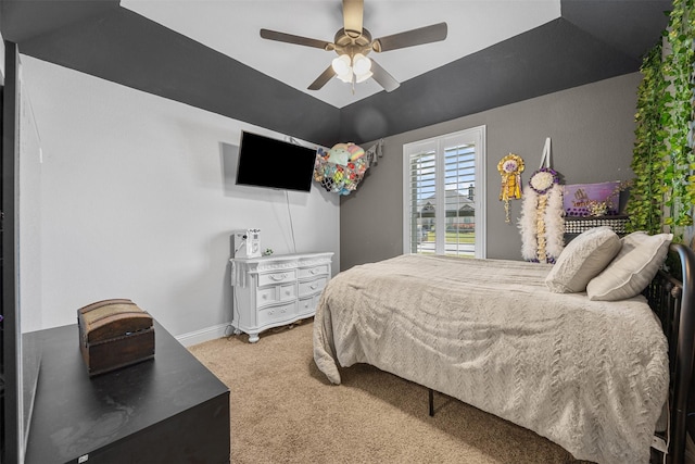 carpeted bedroom featuring ceiling fan and baseboards