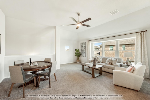living room with lofted ceiling, carpet, visible vents, a ceiling fan, and baseboards