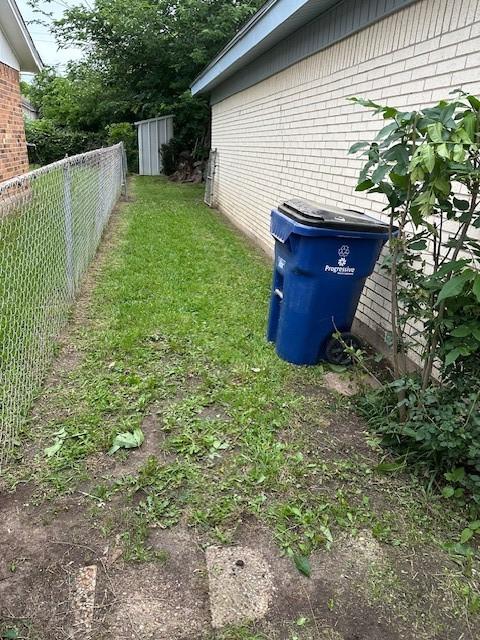 view of yard featuring fence