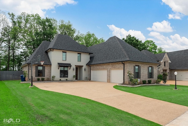 french country style house featuring fence, an attached garage, a shingled roof, and a front lawn