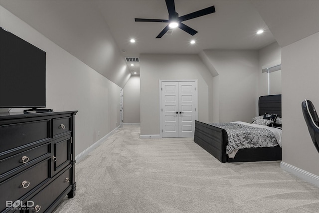 bedroom with a closet, visible vents, baseboards, light carpet, and recessed lighting