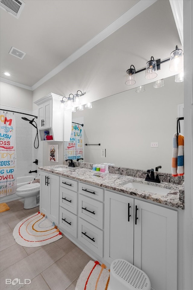 full bathroom with toilet, visible vents, a sink, and double vanity