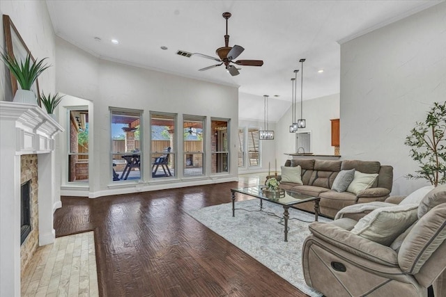 188 Jordan Ct, Lucas, TX 75002 - living room with ceiling fan, wood finished floors, recessed lighting, a stone fireplace, and crown molding