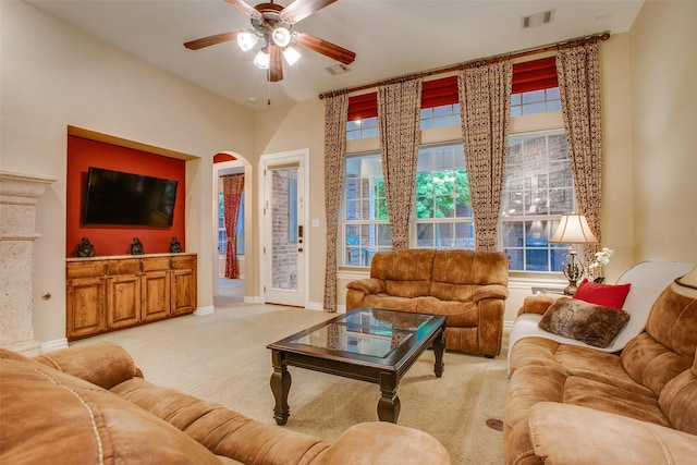 10853 Dixon Branch Dr, Dallas, TX 75218 - living area with ceiling fan, light colored carpet, baseboards, and visible vents