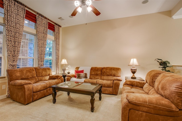 10853 Dixon Branch Dr, Dallas, TX 75218 - living area with baseboards, visible vents, ceiling fan, and carpet