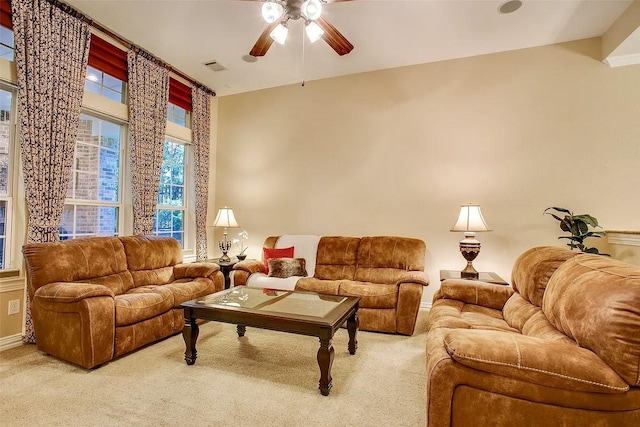 10853 Dixon Branch Dr, Dallas, TX 75218 - carpeted living area featuring a ceiling fan and baseboards