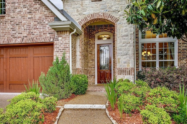 10853 Dixon Branch Dr, Dallas, TX 75218 - entrance to property featuring brick siding, stone siding, and a garage