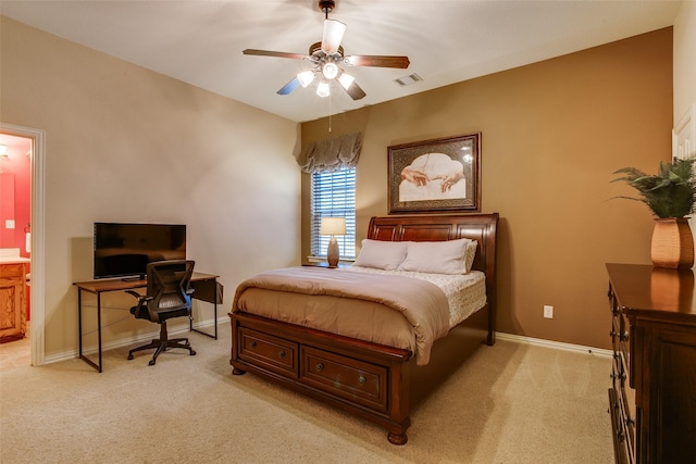10853 Dixon Branch Dr, Dallas, TX 75218 - bedroom with ensuite bath, light carpet, baseboards, and visible vents