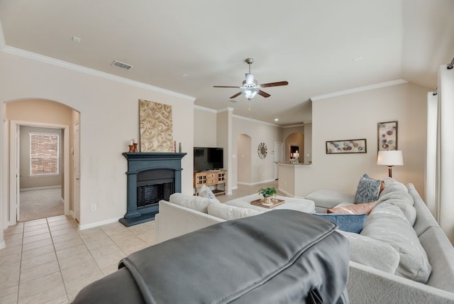 4416 Coney Island Dr, Frisco, TX 75036 - living room featuring ornamental molding, visible vents, a ceiling fan, and arched walkways