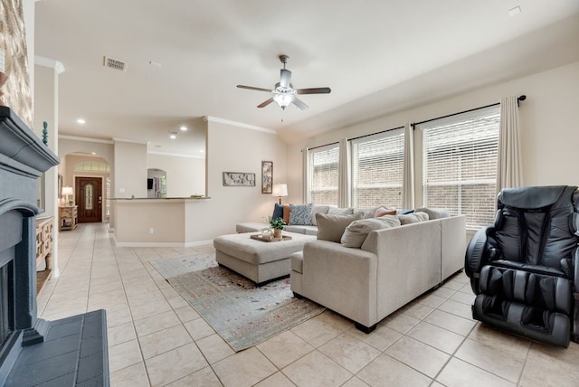 4416 Coney Island Dr, Frisco, TX 75036 - living area with ceiling fan, visible vents, light tile patterned flooring, and arched walkways
