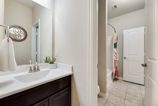 4416 Coney Island Dr, Frisco, TX 75036 - full bath featuring toilet, visible vents, tile patterned flooring, shower / bathtub combination with curtain, and vanity