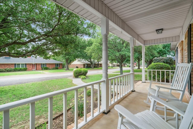 balcony featuring a porch