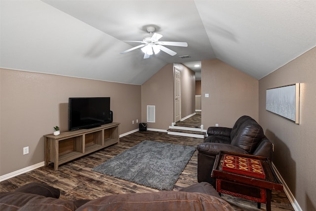 living room with wood finished floors, baseboards, a ceiling fan, and vaulted ceiling