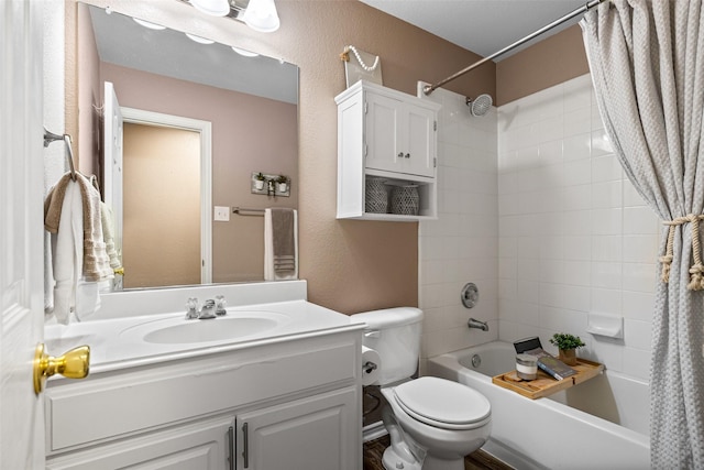 full bath featuring shower / tub combo, vanity, toilet, and a textured wall