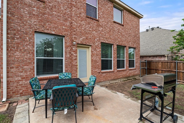 view of patio / terrace with fence and outdoor dining area