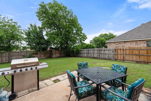 view of patio / terrace featuring area for grilling and outdoor dining space