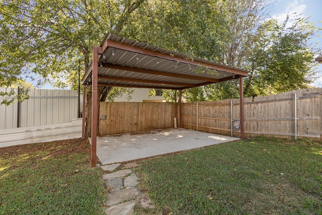 view of yard featuring a patio and a fenced backyard
