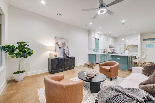 living area with a ceiling fan, recessed lighting, baseboards, visible vents, and concrete flooring