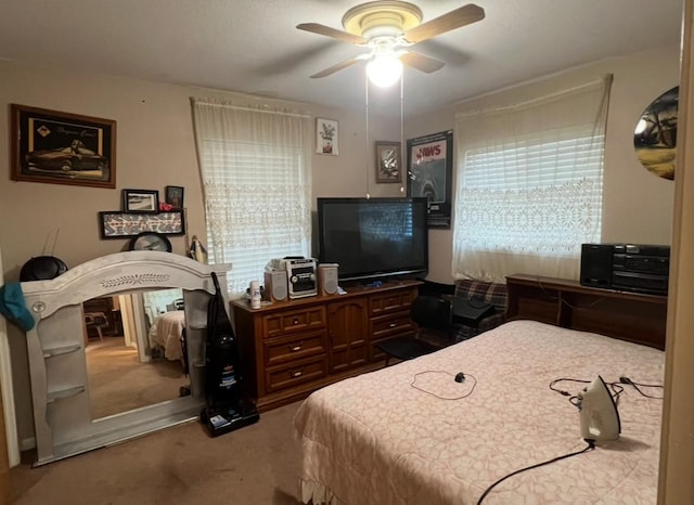 524 Terrace Dr, Desoto, TX 75115 - bedroom featuring carpet floors, multiple windows, and ceiling fan