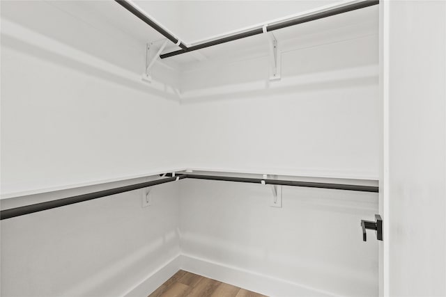 7819 Brownsville Ave, Dallas, TX 75216 - spacious closet with wood finished floors