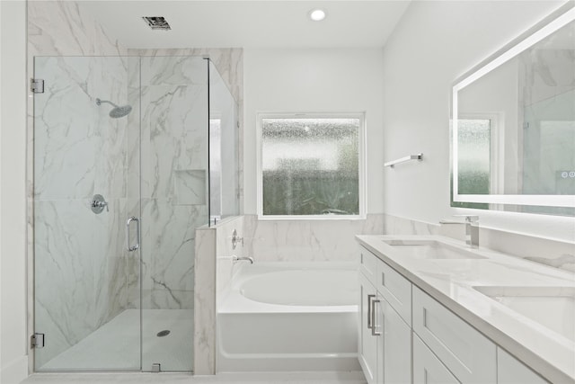 7819 Brownsville Ave, Dallas, TX 75216 - full bathroom featuring a bath, plenty of natural light, a marble finish shower, and a sink
