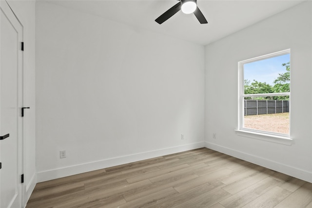 7819 Brownsville Ave, Dallas, TX 75216 - empty room with ceiling fan, baseboards, and light wood-type flooring