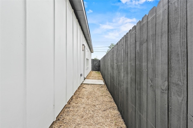 7819 Brownsville Ave, Dallas, TX 75216 - view of home's exterior with fence and board and batten siding