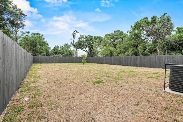7819 Brownsville Ave, Dallas, TX 75216 - view of yard with central air condition unit and a fenced backyard