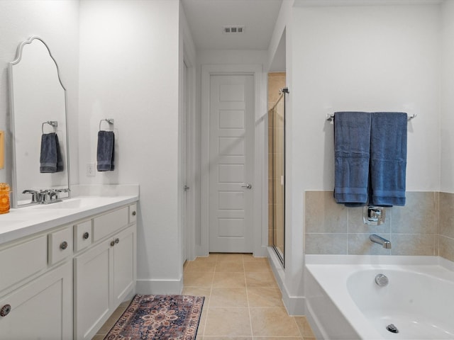 1509 Horizon Way, Northlake, TX 76247 - bathroom featuring a bath, visible vents, baseboards, a shower stall, and tile patterned flooring