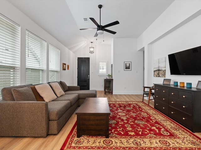 1509 Horizon Way, Northlake, TX 76247 - living area featuring baseboards, ceiling fan, light wood-type flooring, and vaulted ceiling