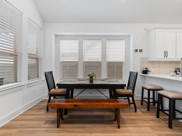 1509 Horizon Way, Northlake, TX 76247 - dining room with light wood-style floors, lofted ceiling, and a healthy amount of sunlight