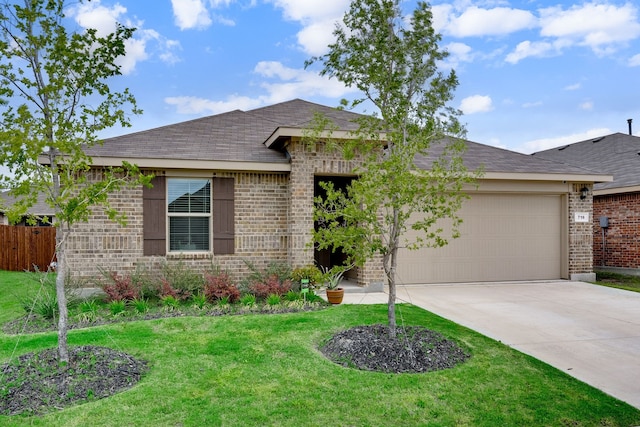 716 Emmons Creek St, Justin, TX 76247 - ranch-style home featuring driveway, brick siding, fence, a garage, and a front yard